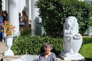 Woman on bench at Graceland