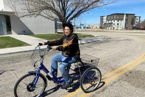 Woman riding electric trike