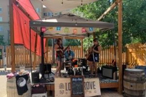 Blaze & Kelly singing at outdoor event