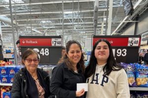 Three women standing in Walmart