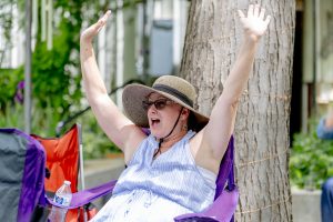 woman with hands up