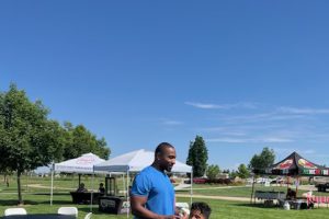 man and boy standing
