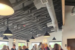 tables with women sitting