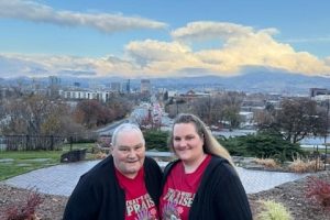 Two women standing at the Boise Train Depot
