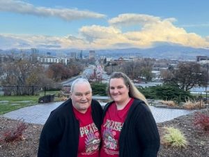 Two women standing at the Boise Train Depot