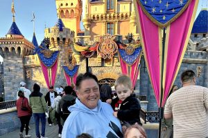 A woman and three children at Disneyland