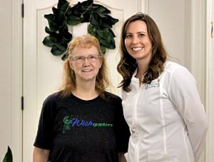 Two women, one with a Wish Granters t-shirt