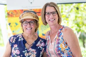 Two women smiling