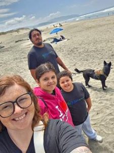 Two adults, two kids, and a dog on the Oregon Coast