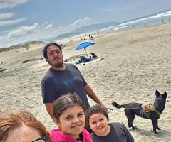 Two adults, two kids, and a dog on the Oregon Coast