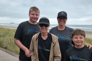 Four people at the beach