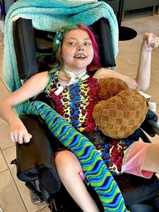A girl in a wheelchair